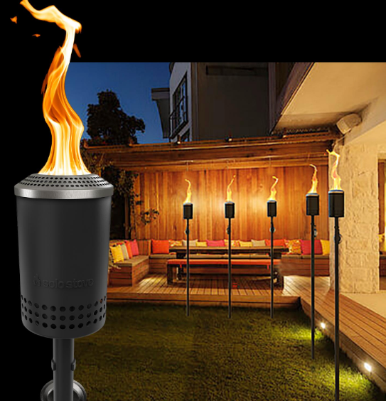 Solo Stove Torches in backyard