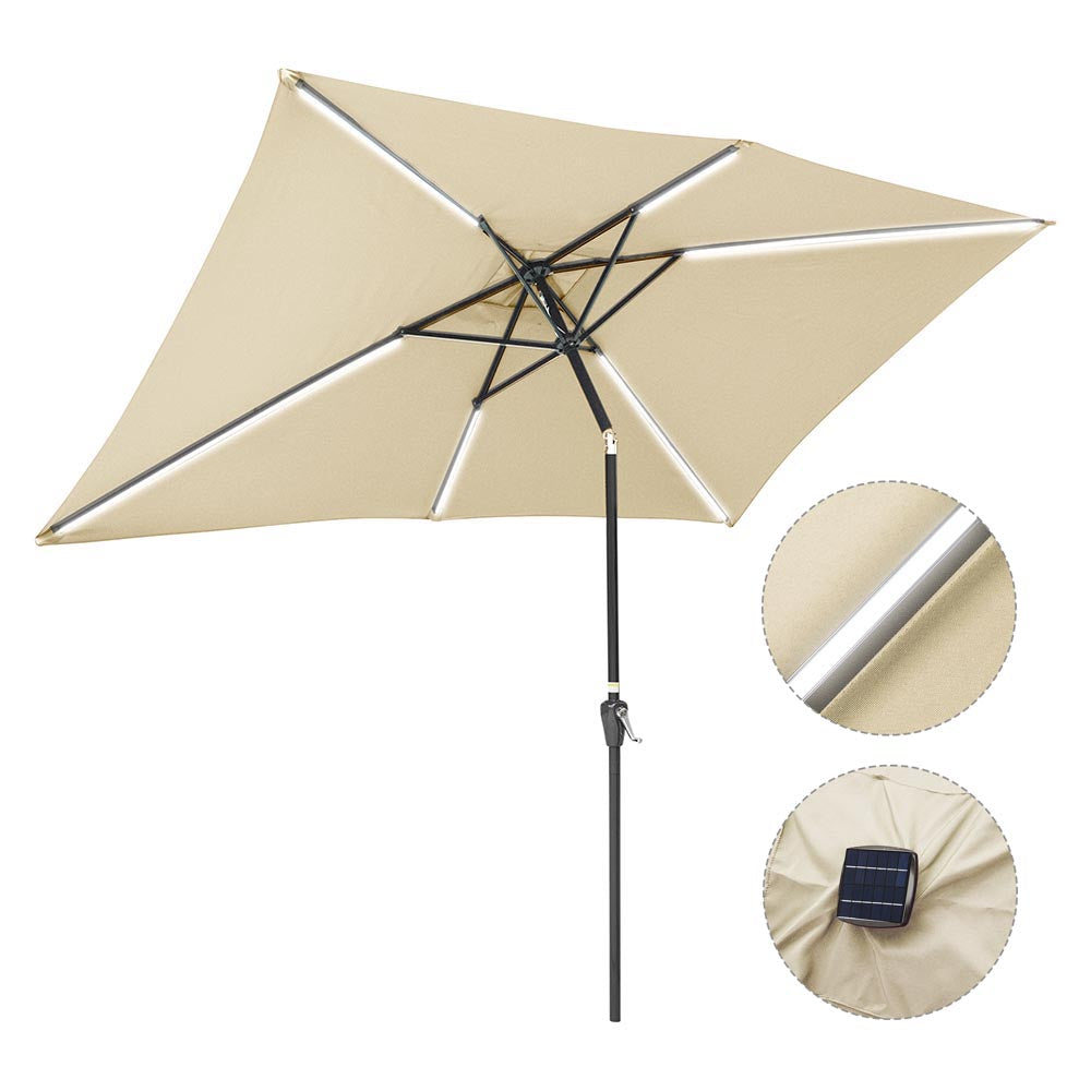 beige patio umbrella with lights
