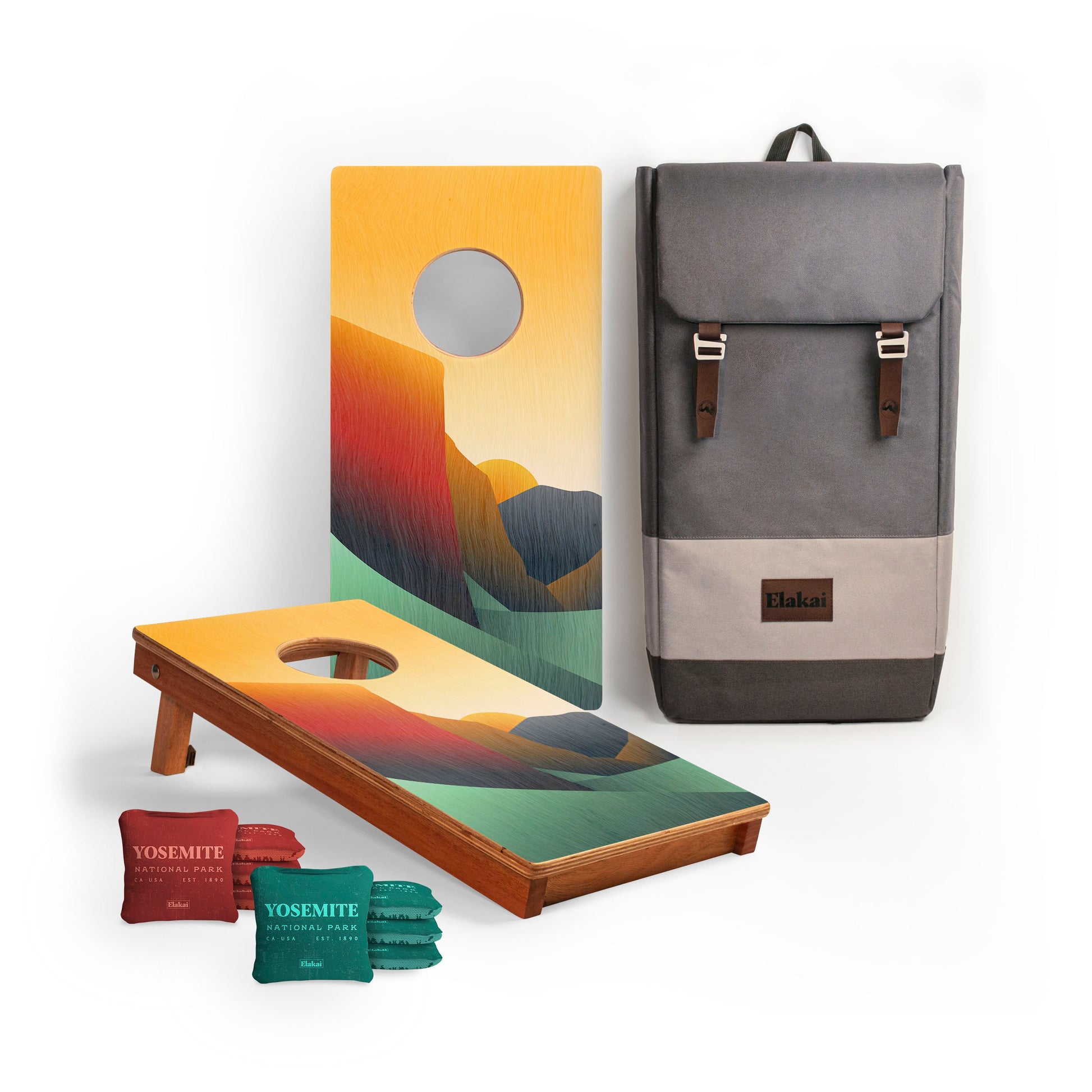 cornhole boards with Yosemite design, cornhole bags, and travel case