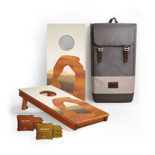 Cornhole set with desert-themed design , bags, and backpack. Arches National Park