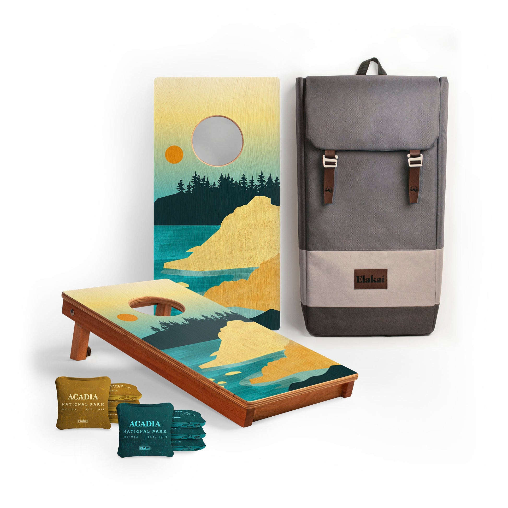 Cornhole board with Adadia National Park design, cornhole bags, and a backpack 