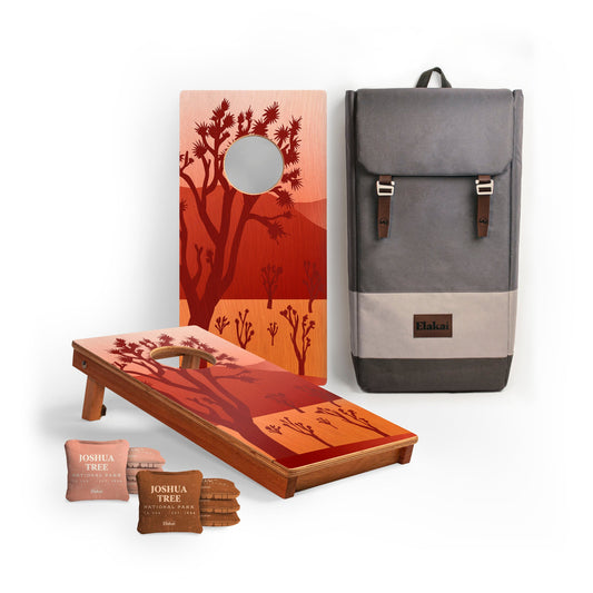 Cornhole board with Joshua Tree design, backpack, and cornhole bags