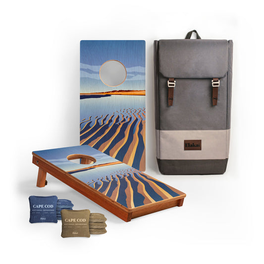 Cornhole boards with beach design, bags, and a backpack. Cape Cod National Seashore