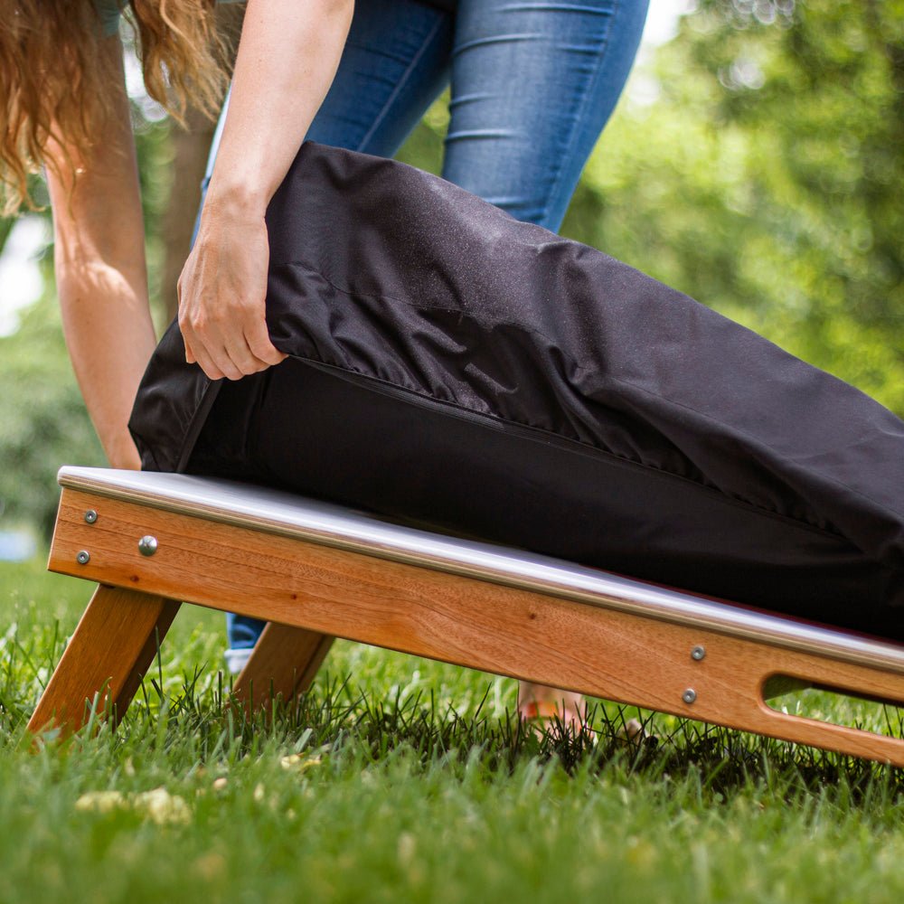 putting a cover on a cornhole board