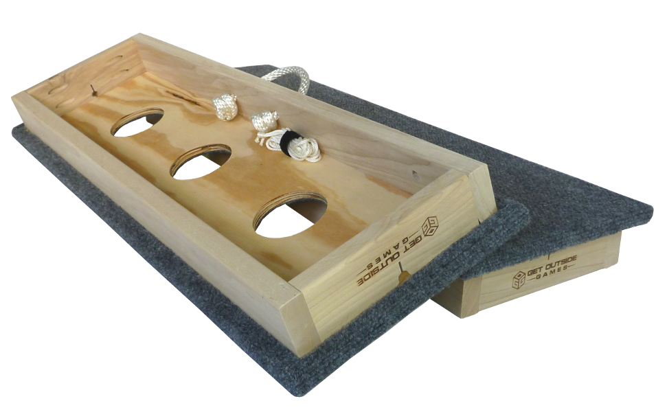 inside of 3 hole washer toss game board